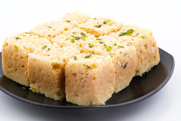 Indian Traditional Famous Sweet Food Mysore Pak or Mysoor Pak Isolated on White Background