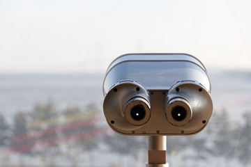 Tourist binoculars. Binoculars telescope on observation deck for tourist.