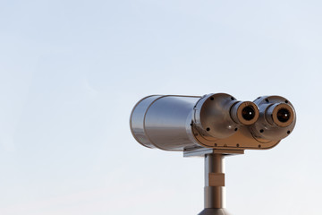 Tourist binoculars. Binoculars telescope on observation deck for tourist.