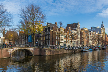 Fototapeta na wymiar Amsterdam, Netherlands - main city and capital of the country, Amsterdam offers a splendid display of history and modernity, surrounded by the unique view of its canals