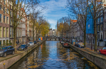 Fototapeta na wymiar Amsterdam, Netherlands - main city and capital of the country, Amsterdam offers a splendid display of history and modernity, surrounded by the unique view of its canals