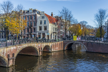 Fototapeta premium Amsterdam, Netherlands - main city and capital of the country, Amsterdam offers a splendid display of history and modernity, surrounded by the unique view of its canals