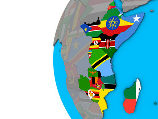 East Africa with national flags on blue political 3D globe. © harvepino