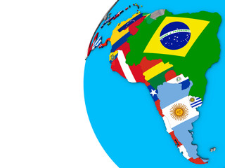 Latin America with national flags on blue political 3D globe.