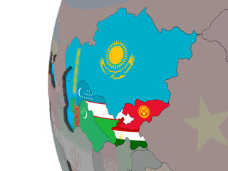 Central Asia with national flags on blue political 3D globe.