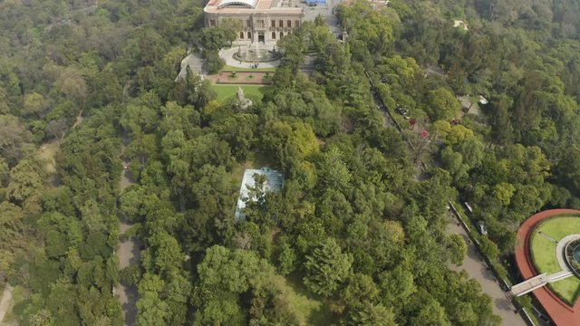 Unique Tilit Up Reveal of the Castle at Chapultepec Park Mexico City and Paseo de la Reforma Street Filmed with 4k Aerial Drone. Hazy Day