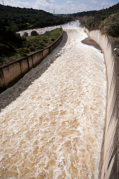 Torrent of water expelled the river of Guadalmellato, Spillway in the reservoir of San Rafael de Navallana, near Cordoba, Andalusia, Spain
