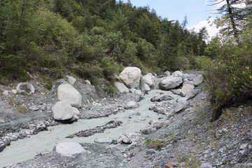 Gray stream of water in the mountain Yarlu River, Altai Mountains, Russia