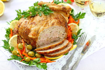 Celebratory food. Baked chicken stuffed with ham and mushrums for festive dinner