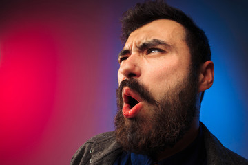 Ew. It's so gross. Young man with disgusted expression repulsing something. Disgust concept. Young...