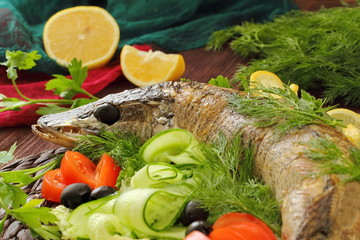 Celebratory food. Stuffed pike on served table