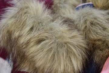 gray texture of fluffy fur on the collar of clothes