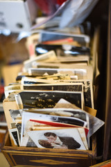 Box with old postcards and photos