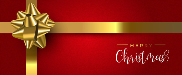 Red Christmas gift web banner with gold ribbon