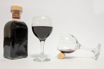 Wine sediment. Red homemade wine. Sediment wine in a glass. A wine steward