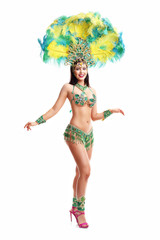 Brazilian woman posing in samba costume over white background