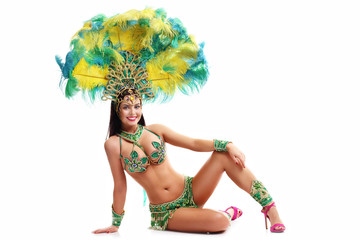 Brazilian woman posing in samba costume over white background