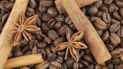 Composition of the cinnamon sticks, anise stars and roasted beans of coffee, background