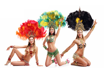Brazilian women dancing samba over white background