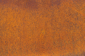 Rust on metallic surface. Rusted iron texture. Rusty metal background with copy space. Rough oxide...