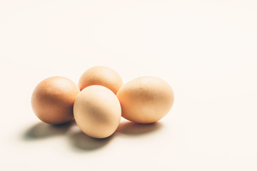 Four organic eggs