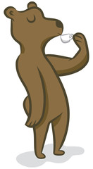 A bear sips a cup of espresso.