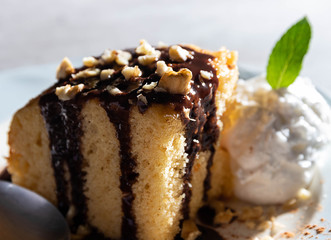 Vanilla cake with chocolate fudge and ice cream