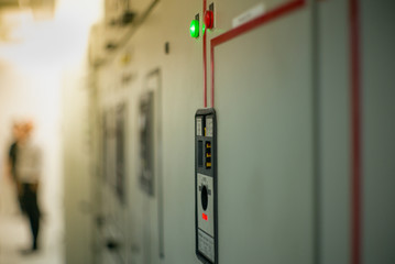 Closeup lighting indicator on the control carbinet in the electrical room