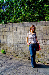 Fototapeta premium Asian female model poses for pictures on the street