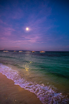Moon during the Sunset over sea. Bohol island