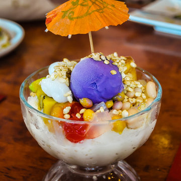 Philippine 'Halo Halo' - Dessert consisting of shaved ice and milk along with various ingredients, including boiled sweet beans, coconut, sago, gulaman (agar jelly), tubers and fruits.