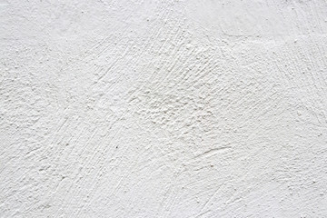 Beige wall with white paint peeling off texture in grey and whit