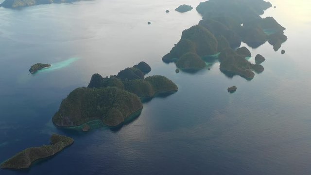 Aerial View of Tropical Islands and Calm Ocean in Raja Ampat