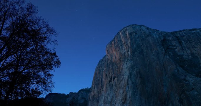 Yosemite El Capitan Mountain Day to Night Time-lapse. a timelapse view looking up at El Capitan Mountain in Yosemite from day to night when the stars come out