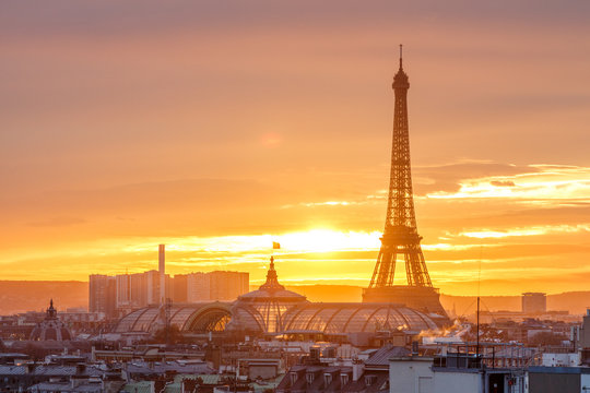 aerial view from the heights on paris and the eiffel tower at sunset