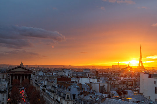 aerial view from the heights on paris and the eiffel tower at sunset