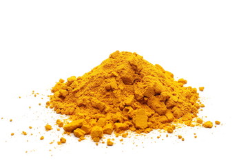 Turmeric powder pile isolated on white background