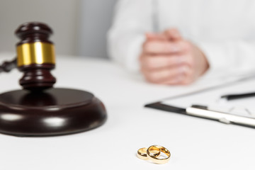 Judge gavel deciding on marriage divorce