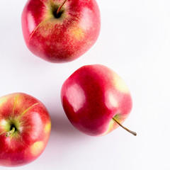 Fresh red apples isolated on white background