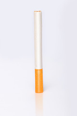 Cigarette in front of white background