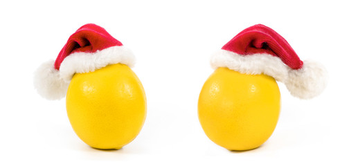 .lemon in christmas hat on white background
