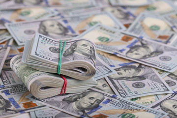 American dollars in one hundred banknotes. Lot of dollars close up