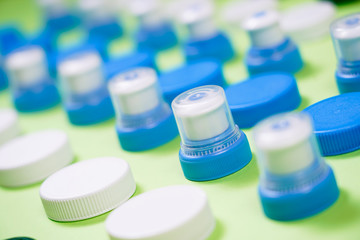 Many different types used or new battery, rechargeable accumulator, alkaline batteries on color...