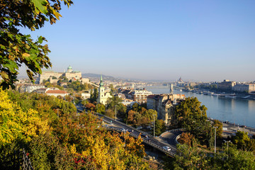 Fototapeta na wymiar Scenic view of ancient historic tourist city Budapest and famous river Danube with bridges over it in autumn in morning light in Hungary