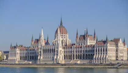 Obraz premium Scenic view of Hungarian parliament in ancient historic tourist city Budapest in daylight light in Hungary