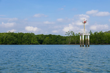 Lighthouse in mangrove area in summer in Thailand, Phang Nga bay national park for vacation, summer, holiday concept