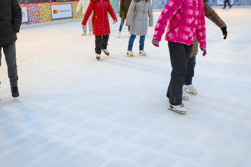 People are skating on rink