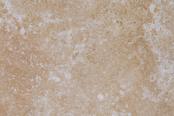 Beige brown abstract marble rough stone wall texture background