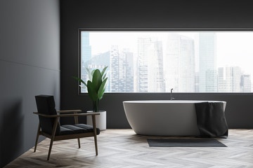 Gray bathroom tub and armchair