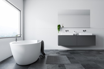 Obraz na płótnie Canvas White bathroom, tub and sink, side view